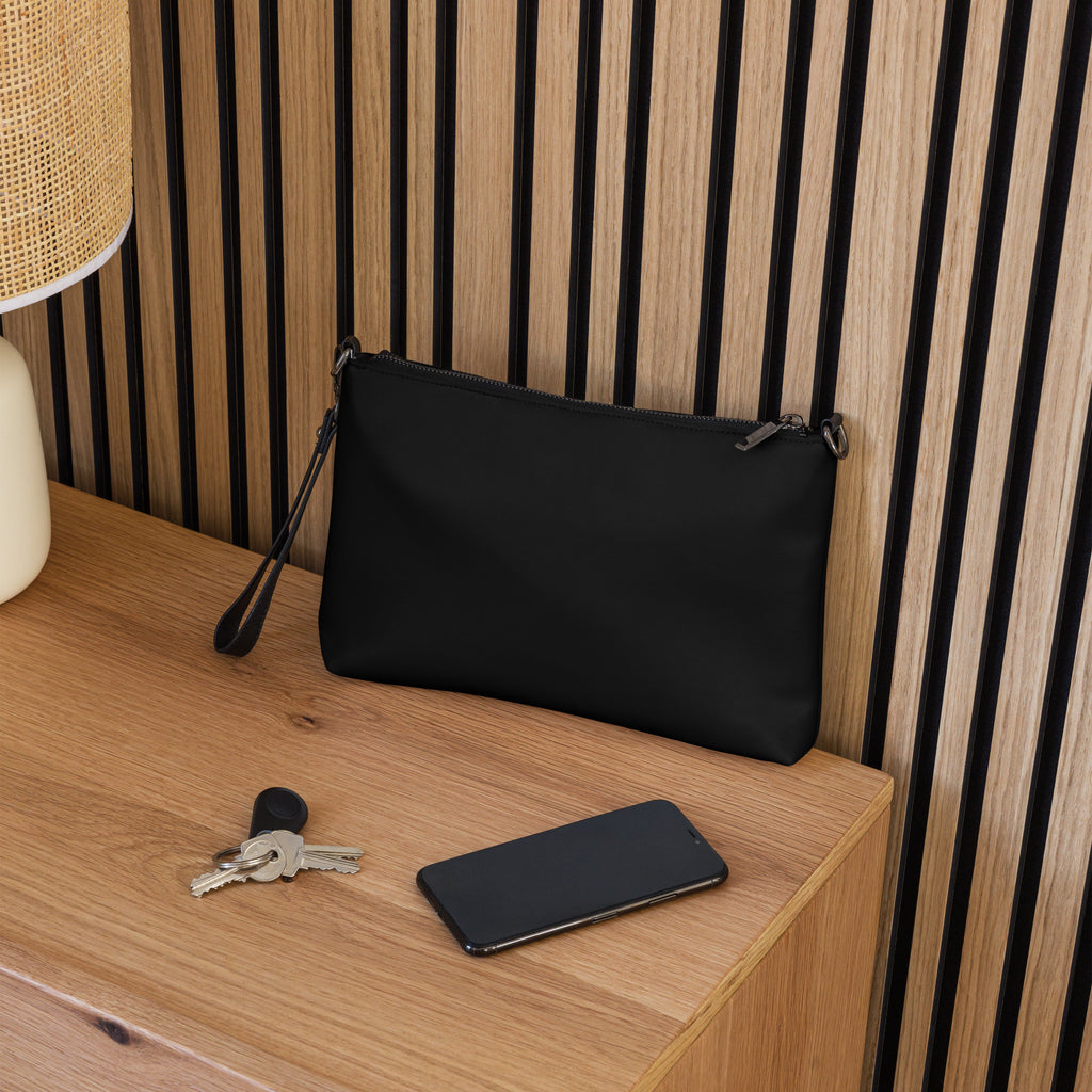 Blessed & Grateful® black faux-leather crossbody bag with white logo print, adjustable strap — back view
