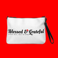 Blessed & Grateful® white faux-leather crossbody bag with logo print, adjustable strap — front view
