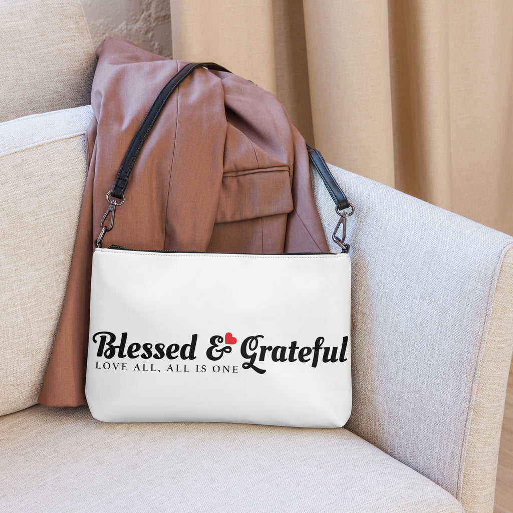 Blessed & Grateful® white faux-leather crossbody bag with logo print, adjustable strap — front view