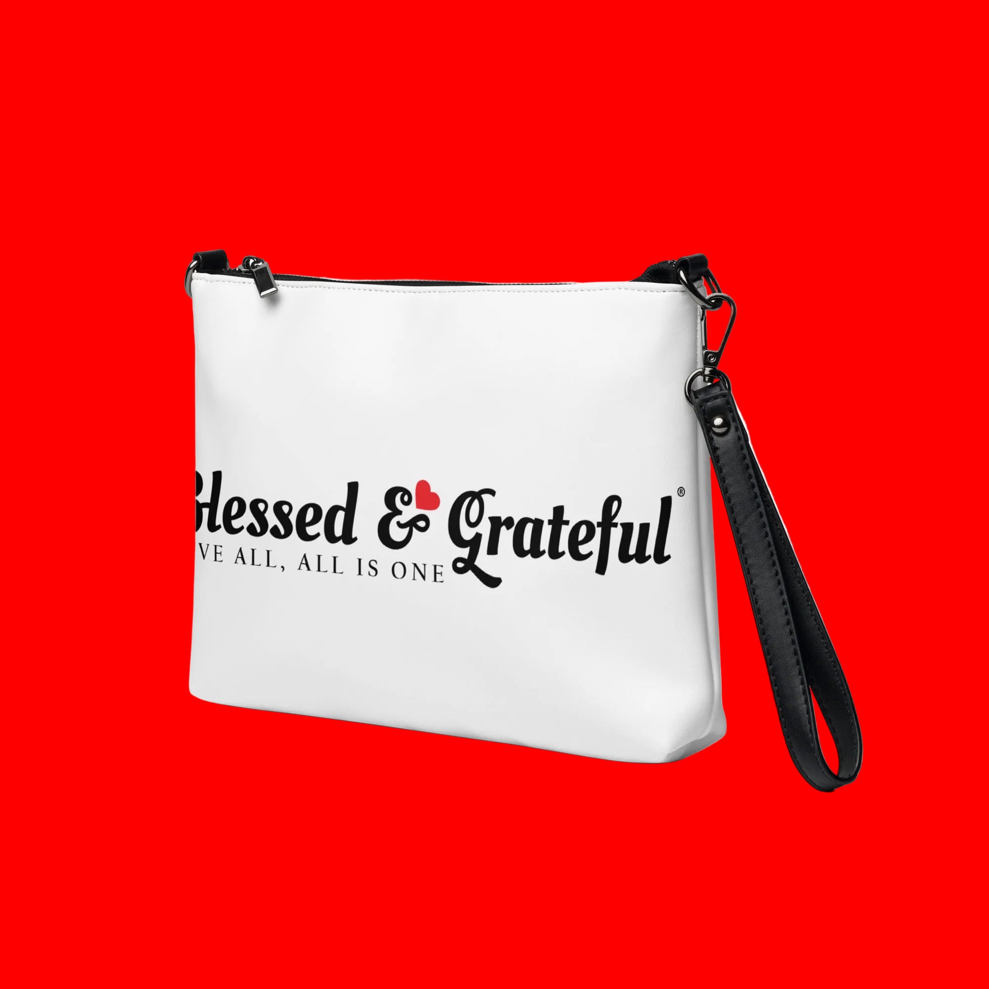 Blessed & Grateful® white faux-leather crossbody bag with logo print, adjustable strap — left side view